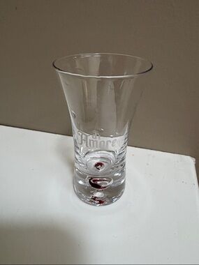 Vintage Di Amore shot glass with a red bubble